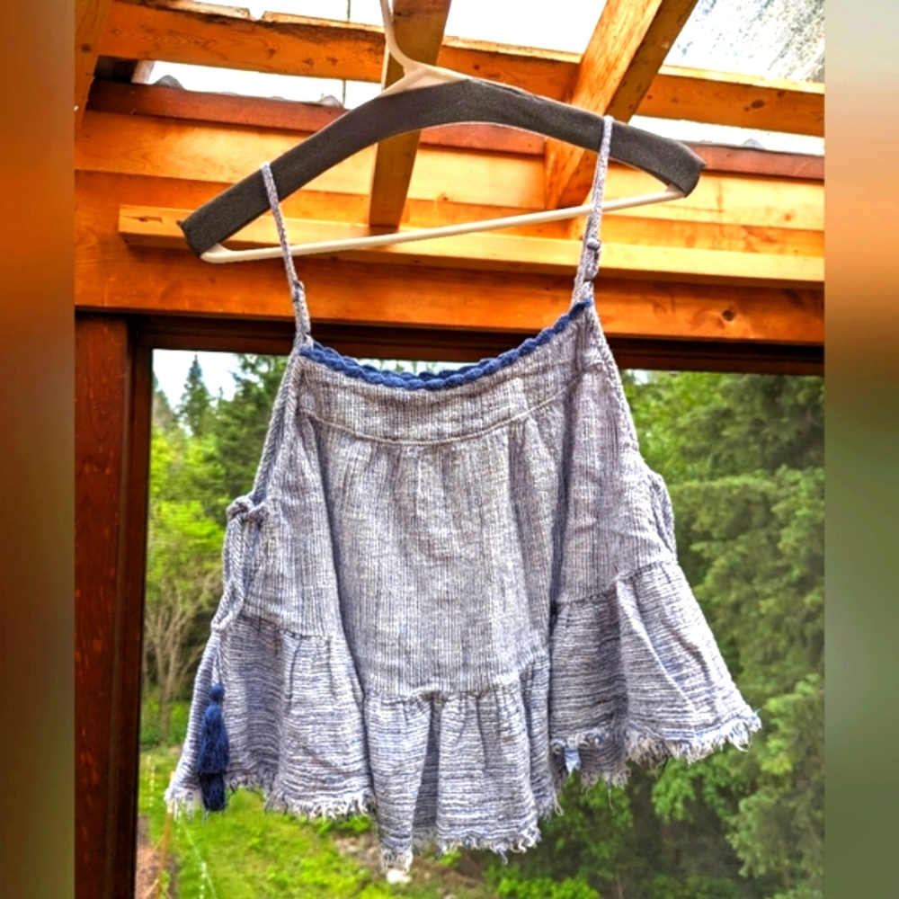 Cropped swing peplum cami